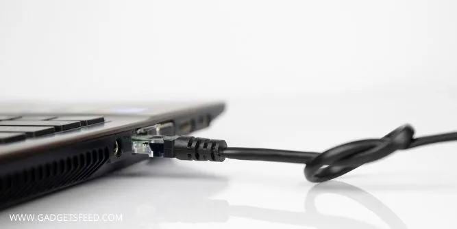 Connect the dock to your laptop